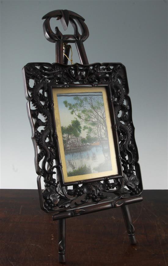 A Chinese hongmu dragon picture frame and a separate hongmu easel, c.1900, total height 62cm, width 26cm